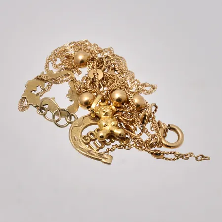 Diverse defekt guld, 10K, vikt 5,13g.