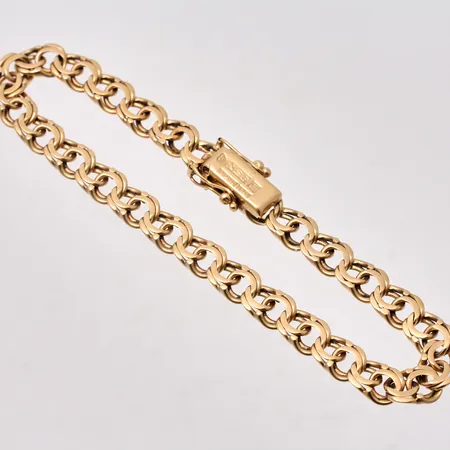 Armband i 18K guld, 19,5cm, Bismarck, redd 6,2mm, tillverkad av N S E Guldvaru Aktiebolag, år 1966, vikt 14,68g.