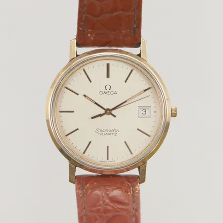 Herrur Omega Seamaster guld på stål 35mm quartz, slitet läderband ej original. Vikt: 0 g