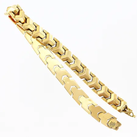 Armband längd 19,5cm, bredd ca 8mm, ihåliga länkbitar, smärre bucklor, 18K Vikt: 13,3 g