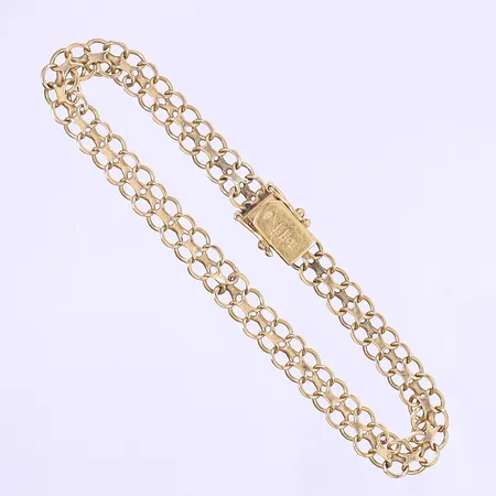 Armband X-länk längd 20cm bredd 6mm mindre bruksslitage 18K Vikt: 9,4 g