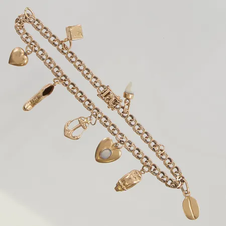 Armband Bismarck 20cm berlocker 18K 11,2g.