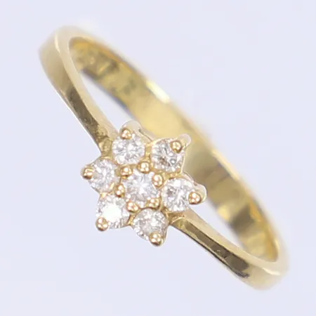 Ring med diamanter totalt ca 0,15ctv stl: 17 bredd 2-7mm 18K Vikt: 2,2 g