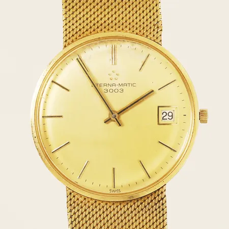 Herrur Eterna-matic 3003 18K Ø34mm, automatisk serie nr 665 5001 68 sliten urtavla repor på plexiglas, skev länk i 18K, bruttovikt: 78,3g