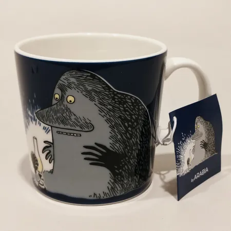 Muminmugg Mårran / Mörkö, Arabia Finland höjd 8cm Ø8cm märkt QC0125 etikettmärkt samt lapp porslin 