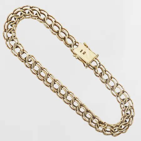 Armband längd 20,5cm, bredd 7mm, skeva länkar, 18K Vikt: 17 g