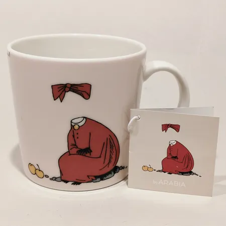 Muminmugg Ninni, Arabia Finland höjd 8cm Ø8cm märkt QC1224 etikettmärkt samt lapp porslin
