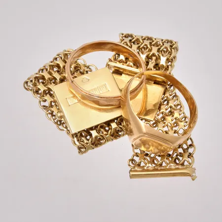 Diverse defekt guld, 18K, 33,95g.