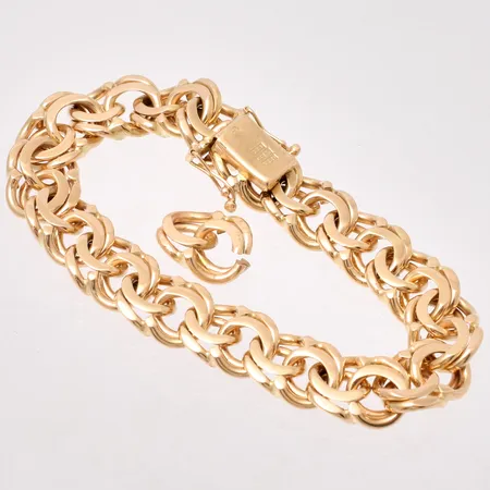 Armband 19cm Bismarck bredd 11,6mm, med en extra länk, G S K Present Ab, 18K, 55,99g.
