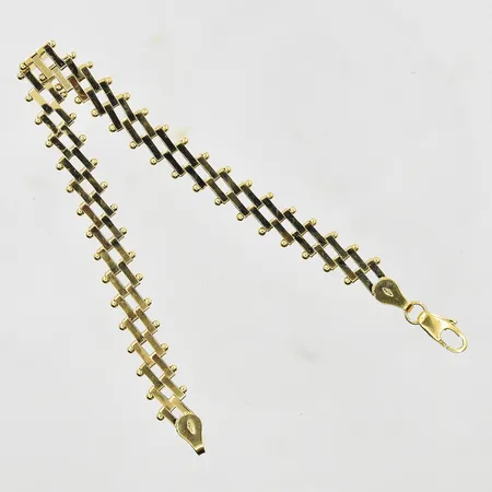 Armband ledad modell längd:18cm, bredd 7mm, 18K. Vikt: 9,6 g