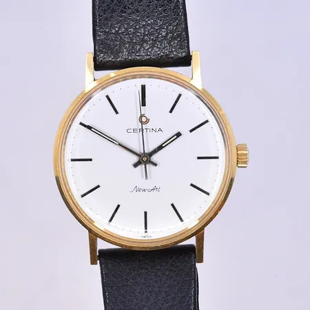 Herrur Certina New art manuell Ø33 mm, graverad 18K.