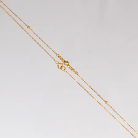 Collier längd 45cm, bredd 1-3,8mm, 21K Vikt: 2,4 g