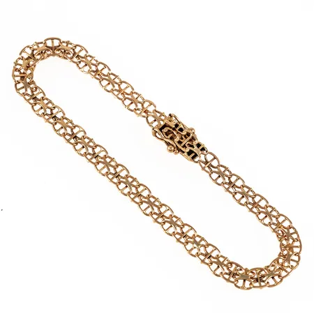 Armband X-länk med stav 19,5cm bredd 5,5mm, något nötta länkar mot låset, 18K 6,2g. 