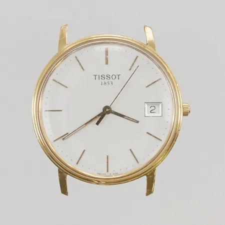 Herrur Tissot 18K 33mm quartz, repig, gravyr, bruttovikt 23,2g.