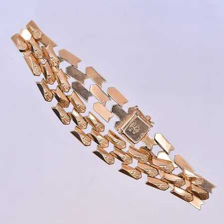 Armband längd 20 cm, bredd 11 mm 18K. Vikt: 20,2 g