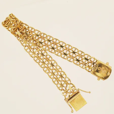 Armband X-länk längd 17cm bredd 11mm, ÄSA Stockholm 1966 18K Vikt: 17,3 g