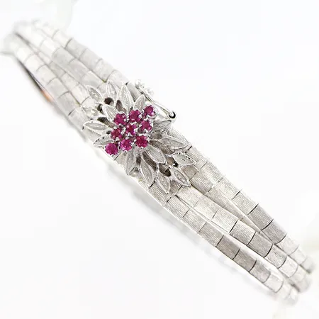 Armband vitguld rosa stenar längd 18,5cm, fyrradigt och halvstelt, länkar med matterad yta, 12mm, 18K Vikt: 29 g