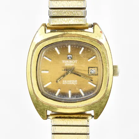 Herrur Tissot Seastar, stål/doublé, Ø37mm, datum, defekt/går ej, defekt tid/datumställning, flexband i doublé, inga tillbehör.