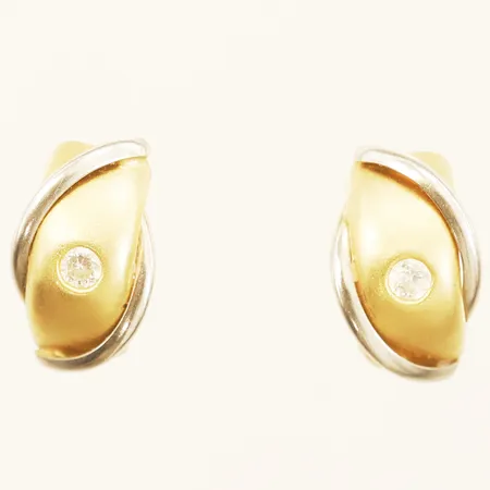 Ett par örhängen tvåfärgade med vita stenar, längd 14mm, bredd 8,5mm 18K  Vikt: 1,6 g