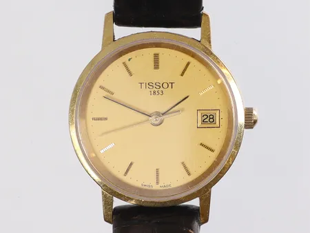Damur Tissot 18K Ø24mm quartz (går ej), datum, guld i boett med defekt läderband bruttovikt 17,5g 