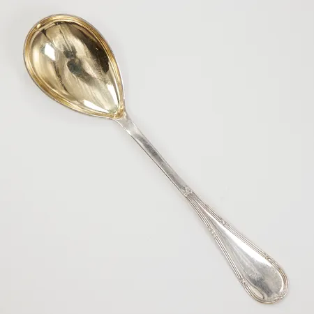 Serveringssked 20cm, modell Rosett, Otto Larsson Landskrona år 1918, delvis förgylld, silver Vikt: 43 g