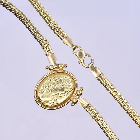 Collier med integrerat hänge längd 44,5 cm, bredd 4-20 mm 18K. Vikt: 13,3 g
