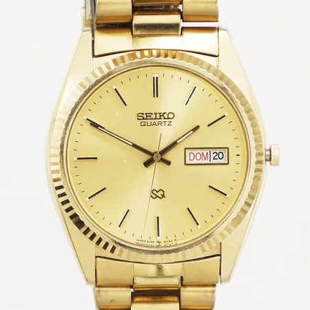 Herrur Seiko SQ gulmetall quartz ref-nr:5Y238A69 serie nr:8d1206 armband inklusive boetten ca 19cm repig etui.
