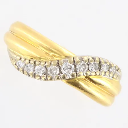 Ring med diamanter 9x0,20ctv enligt gravyr stl:17¼, bredd: 2-7mm, 18K Vikt: 3,3 g