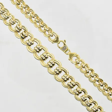 Collier doserad längd 46cm, bredd 10-14mm, gulguld/vitguld, 18K. Vikt: 30,5 g