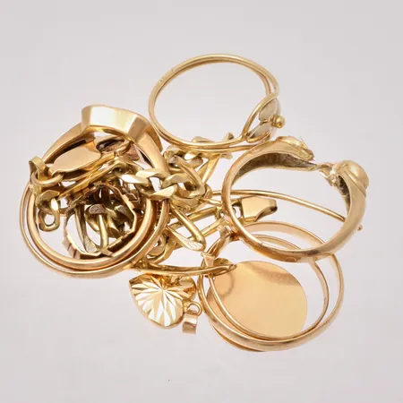 Diverse defekt guld, 18K, 27,72g.
