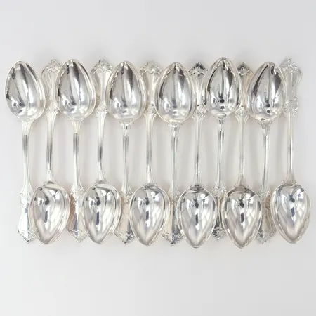 Tolv skedar längd 12,5cm Silver 830/1000.  Vikt: 258,7 g