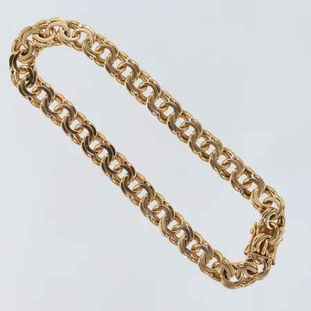 Armband Bismarck längd 20,5cm bredd 7mm 18K.  Vikt: 20,3 g