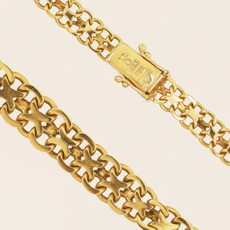 Collier doserad X-länk längd 45,5cm, bredd 5,7-9,4mm lätt skev, Hedens Guldsmeds Ab Bröderna år 1966 18K Vikt: 31,6 g