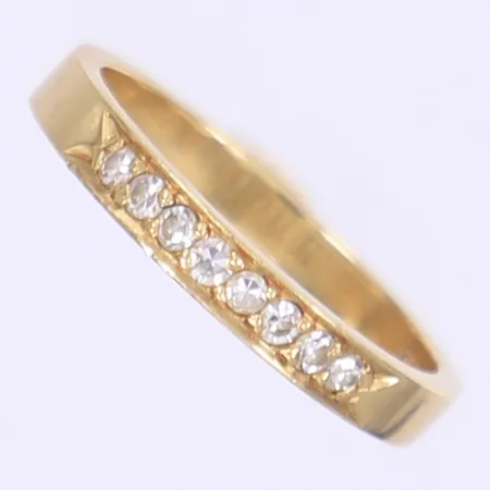 Ring med åttkantsslipade diamanter 8x ca0,02ct stl:17½, bredd 3mm, Bengt Hallberg, 18K Vikt: 3,3 g
