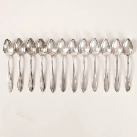 Tolv skedar längd 11cm, silver 830/1000 Vikt: 124,4 g