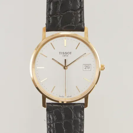 Herrur Tissot 18K 33mm, quartz, går ej, graverad "Kungliga patriotiska sällskapet", box, ytterkartong.