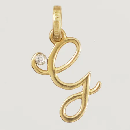 Hänge med diamant 1x0,02ct längd inkl ögla 20mm, bredd 9mm 18K  Vikt: 0,9 g