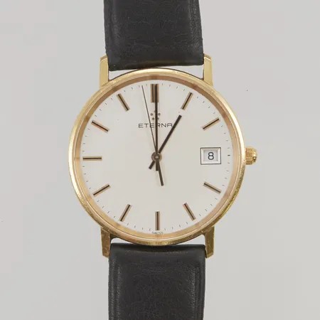 Herrur Eterna 18K 33,5mm quartz, nr4100 68, går ej, läderband, gravyr.