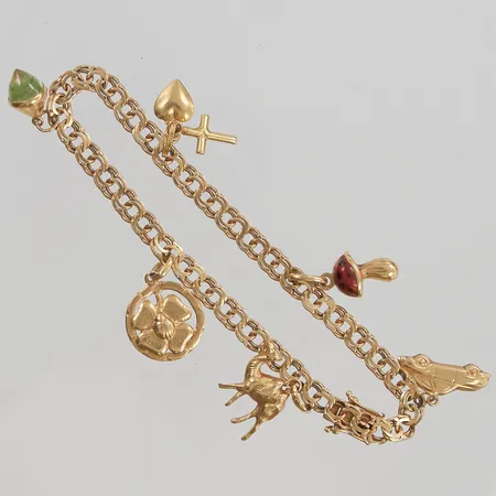 Armband 19cm bredd 5mm berlocker 18K 12,6g.