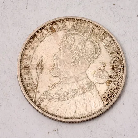 Jubileumsmynt, Oscar II, minne av 25-årig regering, nominellt värde 2kr, 1872-1897, 14,96g.
