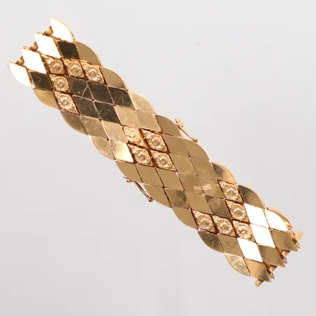 Armband längd 18,5cm, bredd 18,7mm, kistlås, 18K Vikt: 34,4 g