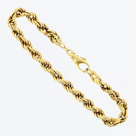 Armband Cordell längd 21cm bredd 6mm ihålig defekter 18K.  Vikt: 10,9 g