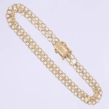 Armband X-länk längd 20,5cm bredd 7mm 18K Vikt: 10,5 g