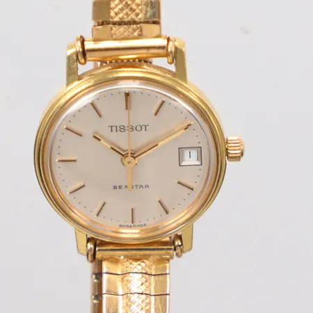 Damur Tissot seastar Ø22mm quartz går ej, gravyr längd 16,5cm helguld, med säkerhetskedja, 18k brutto Vikt: 26,2 g