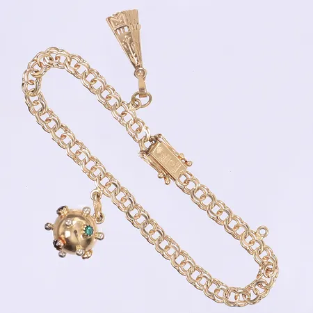 Armband Bismarck med två berlocker längd 17cm bredd 5mm 18K Vikt: 11,2 g