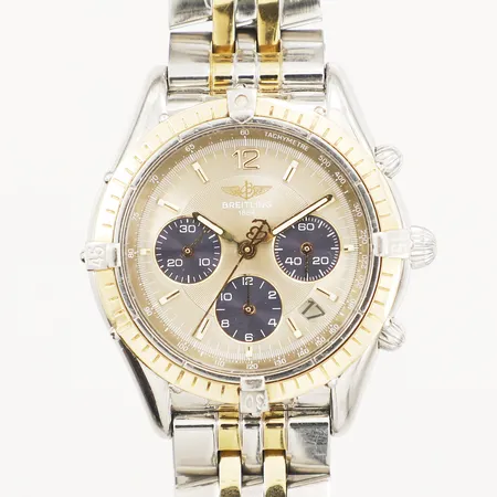 Herrur Breitling Chrono Cockpit guld/stål automatisk ref-nr:D30012 serie-nr:1554 Ø37mm armband ej original gulmetall/stål certifikat ej datumstämplad.