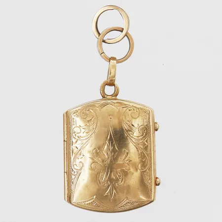 Hänge/Medaljong med blomsterdekor, höjd 30mm, bredd 20mm, två extra öglor, bucklor, 19K guld (765/1000), bruttovikt: 6,0gr Vikt: 6 g