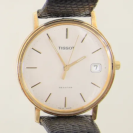 Herrur Tissot Seastar 14K quartz Ø34mm, datum, plastglas, box, läderband original med lätt slitage, något repig boett, gravyr, fungerar ej, i behov av batteribyte, inga tillbehör 