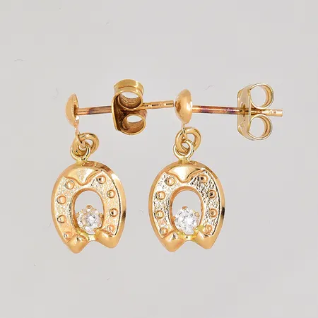 Örhängen hästskor med vita stenar, längd 17mm, bredd 8mm, 18K. Vikt: 1 g