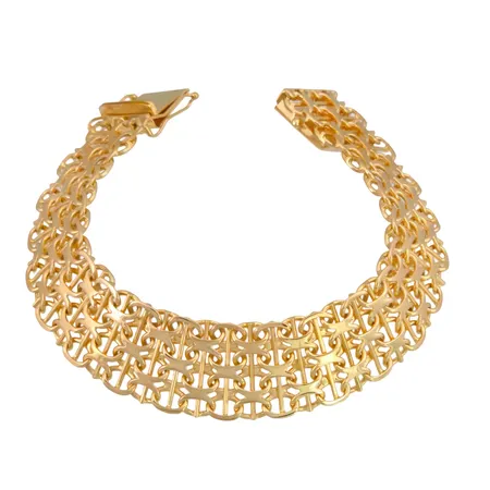Armband X-länk med stav, 18K guld, treradig modell, tillverkarstämpel AM, svensk kontrollstämpel, längd knäppt 18,5 cm, bredd 16 mm, tjocklek 2,1 mm, fint skick Vikt: 33,7 g